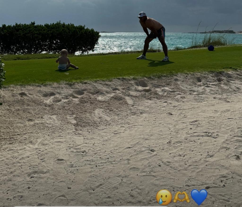 Brooks Koepka is seen with son Crew.