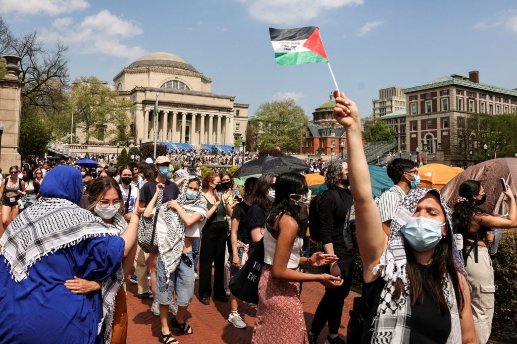 Students march and rally on Columbia University campus in support of a protest encampment supporting Palestinians, despite a 2pm deadline issued by university officials to disband or face suspension.