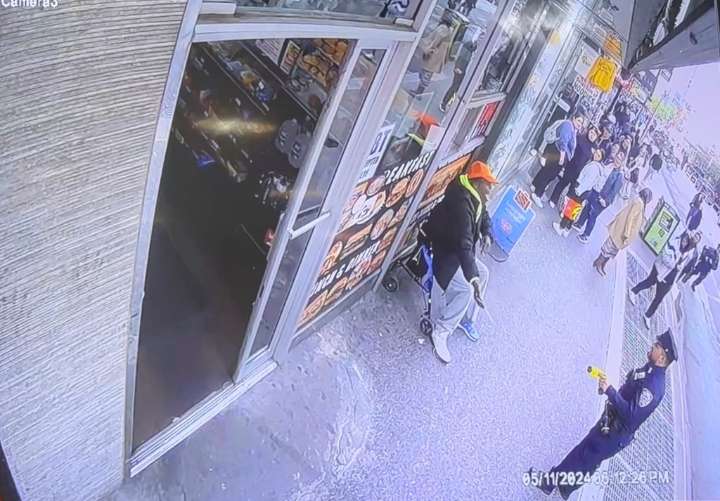 Surveillance video obtained by the Post shows the moment Cyril Destin allegedly slashes tourist Amber Lohr at the intersection of W 43 St and Eighth Ave near TImes Square Saturday, May 11, 2024.