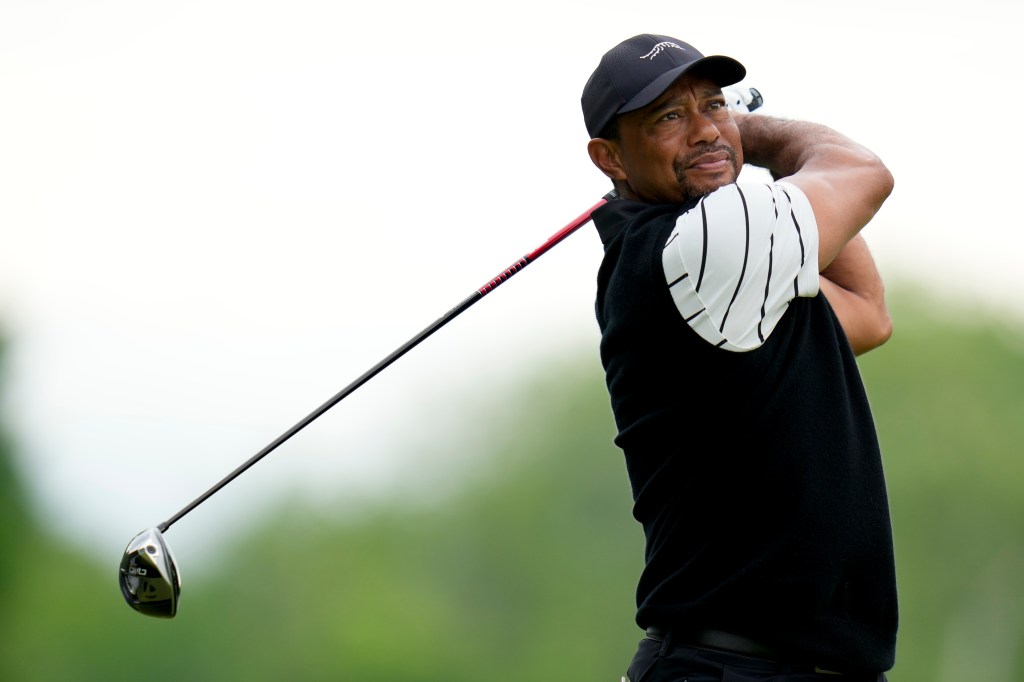 Tiger Woods hits his tee shot on the fifth hole during a practice round for the PGA Championship.