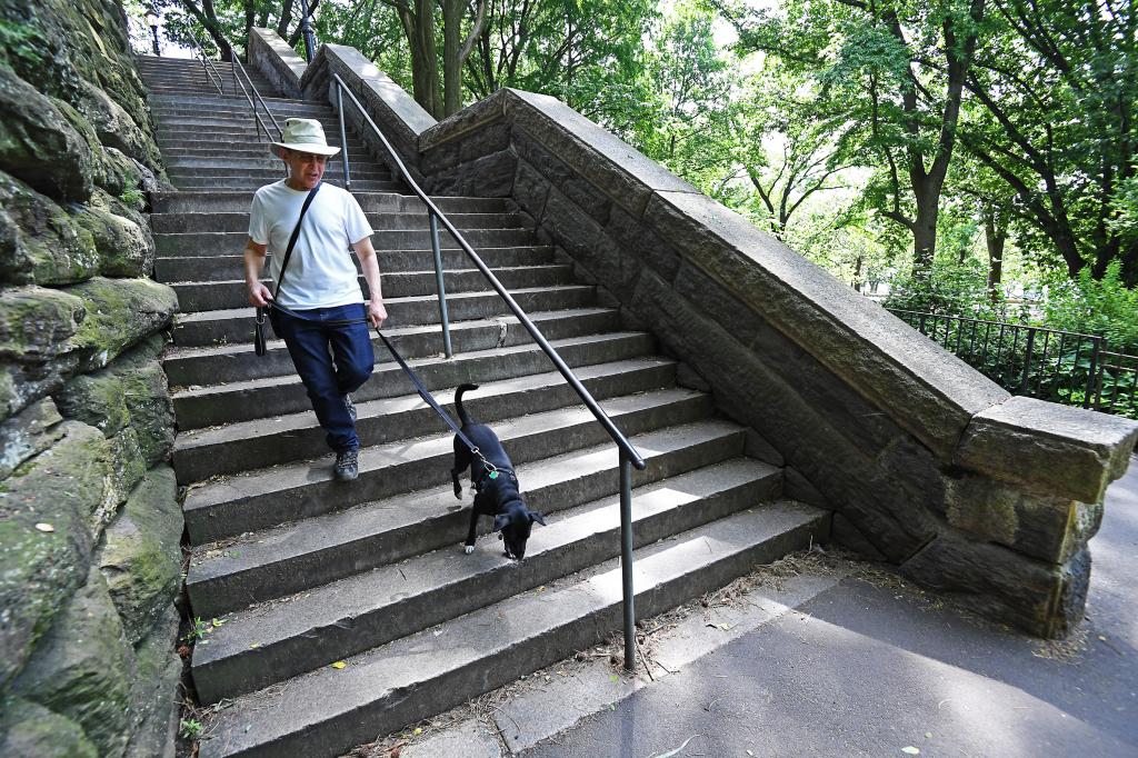 Jonathan Weiner, 70, navigates stairs near 104th Street which are known by neighbors for being precariously slick