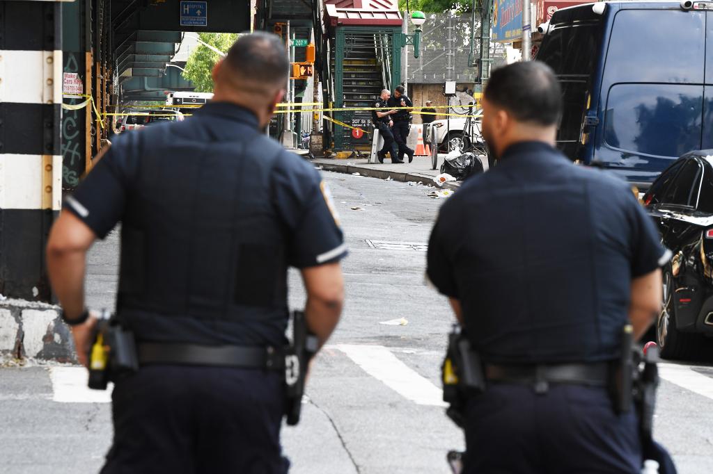  The NYPD continue to lock down the block between W 206 and W 207th Streets along 10th Ave, in NYC, after a shooting occurred early this morning involving multiple victims. 