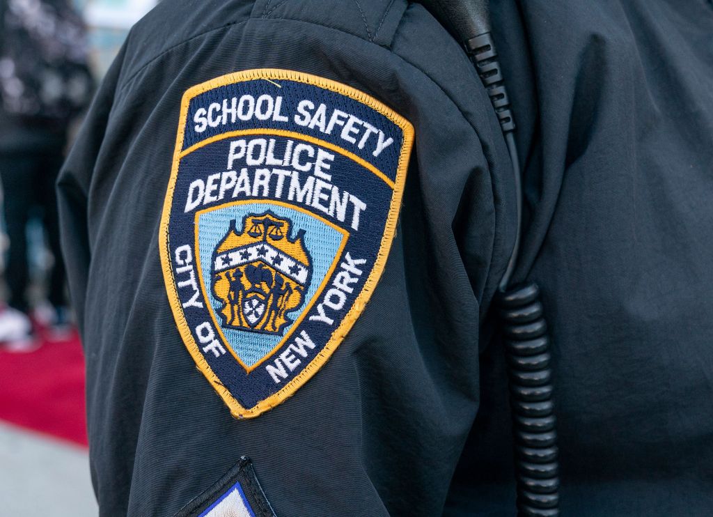 School safety police officer insignia seen during Mayor Bill de Blasio visit of Bronx Leaders of Tomorrow Richard R. Green Middle School on reopening day during COVID-19 pandemic