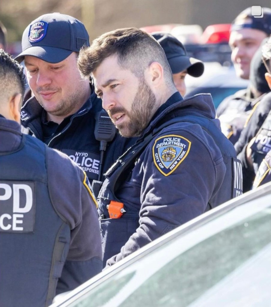 Diller with other police officers in an undated photo.