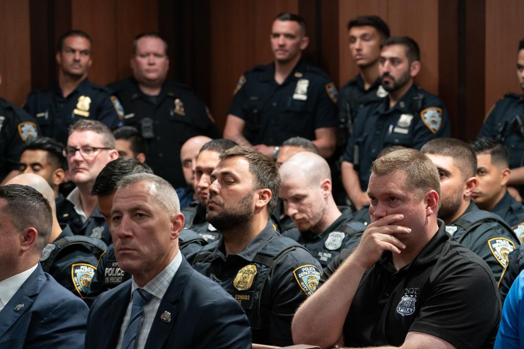 NYPD officers watch as Bernardo Castro Mata,19, appears in Queens Criminal Court June 5, 2024. 