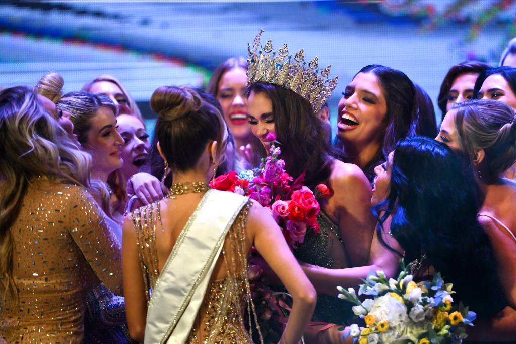 Miss Universe Cordoba 2024 Magaly Benejam (C) celebrates after being crowned Miss Universe Argentina 2024 during the final of Miss Universe Argentina beauty contest in Buenos Aires on May 25, 2024.