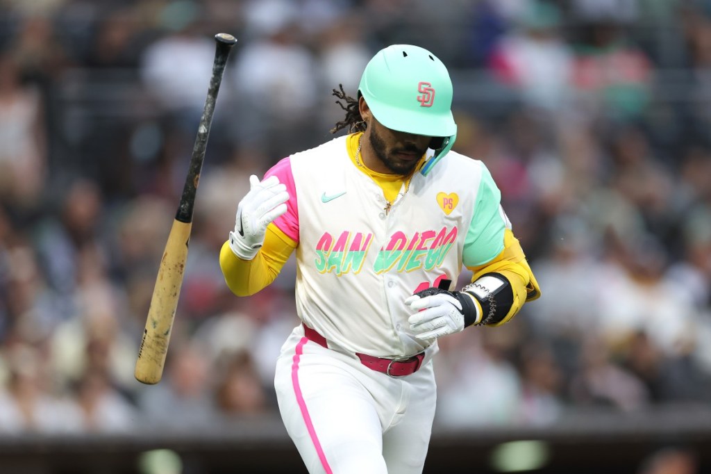 Luis Campusano #12 of the San Diego Padres throws his bat after flying out