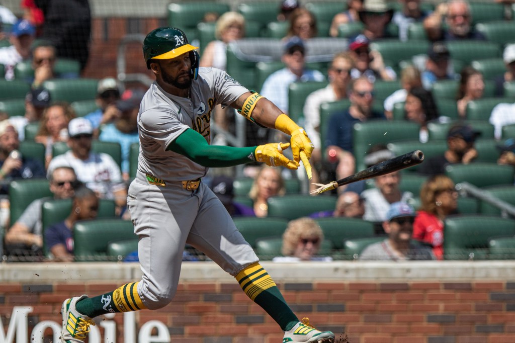 Miguel Andujar (22)  split bat while hitting ground ball against the Oakland Athletics during the eighth inning.