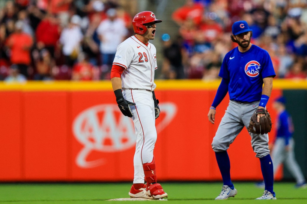 TJ Friedl (29) reacts after hitting a RBI double in the sixth inning against the Chicago Cubs.