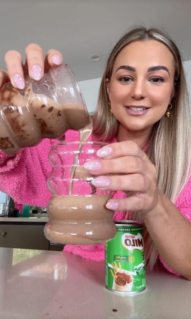 woman pouring drink