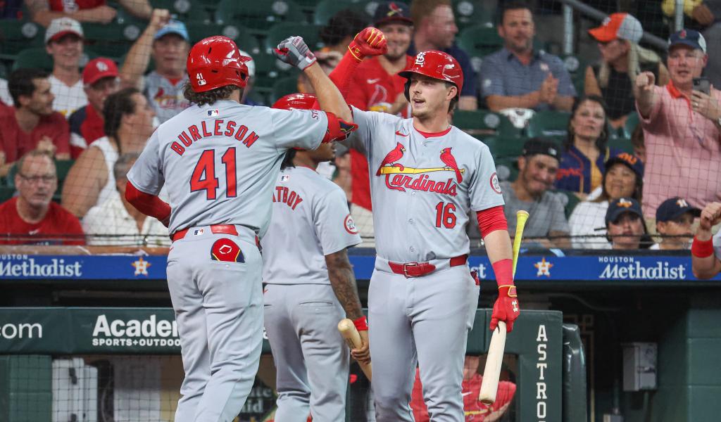 St. Louis Cardinals right fielder Alec Burleson (41) celebrates with second baseman Nolan Gorman (16) after hitting a home run during the first inning against the Houston Astros at Minute Maid Park. 