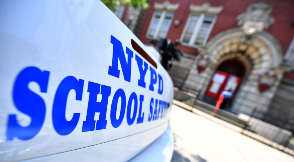 Police personnel and school safety officers at Public School 91 in Brooklyn, NYC addressing an incident where a child brought a gun into school