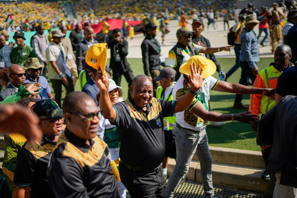 South African President Cyril Ramaphosa greets African National Congress supporters at a rally at FNB stadium in Johannesburg on May 25, 2024.