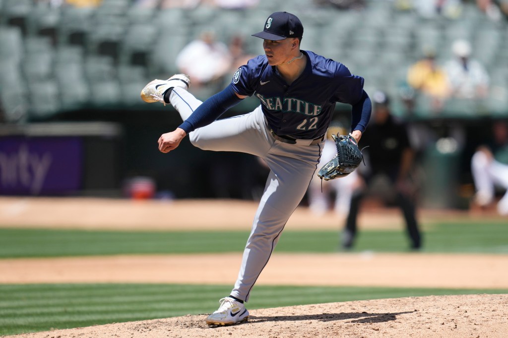 Seattle Mariners pitcher Bryan Woo works against the Oakland Athletics 