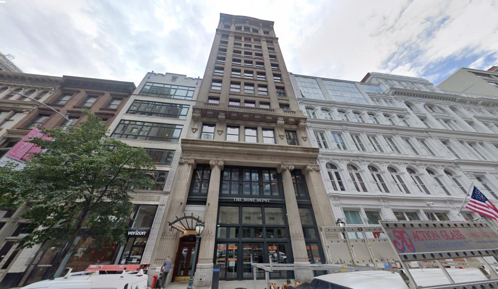 Tall building with many windows, identified as the Ramp Finance building located at 28 W 23rd St, Flatiron, New York City