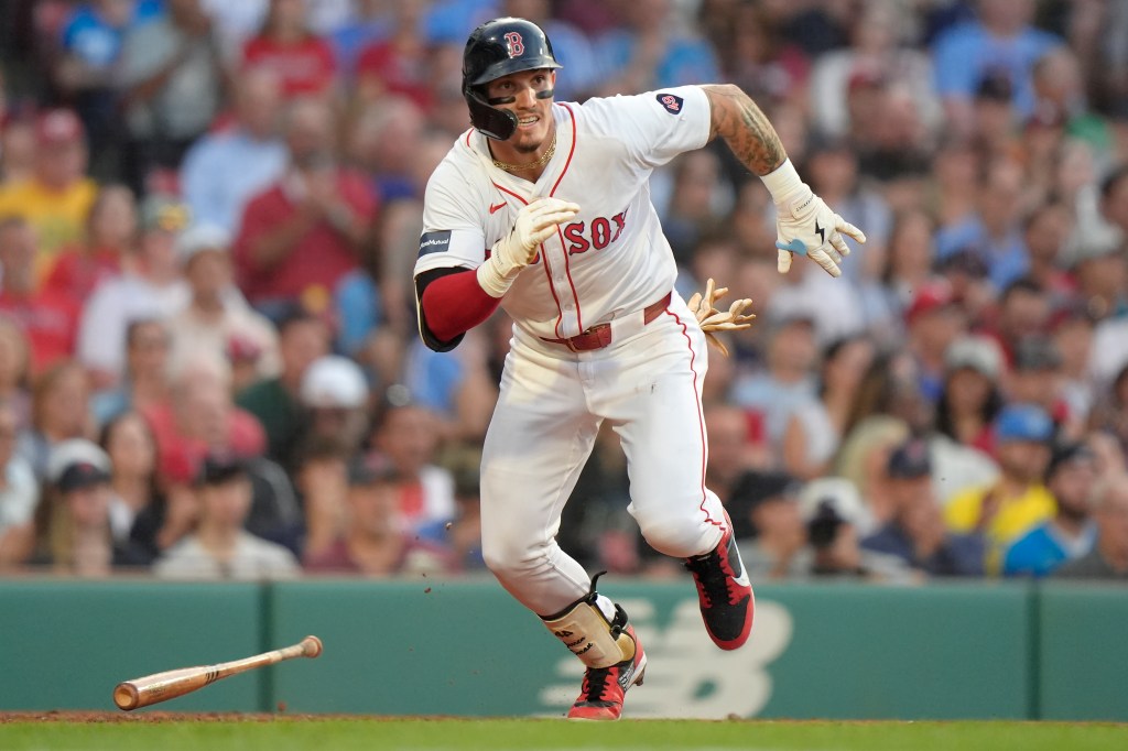 Boston Red Sox's Jarren Duran runs after hitting a two-run double against the Philadelphia Phillies.