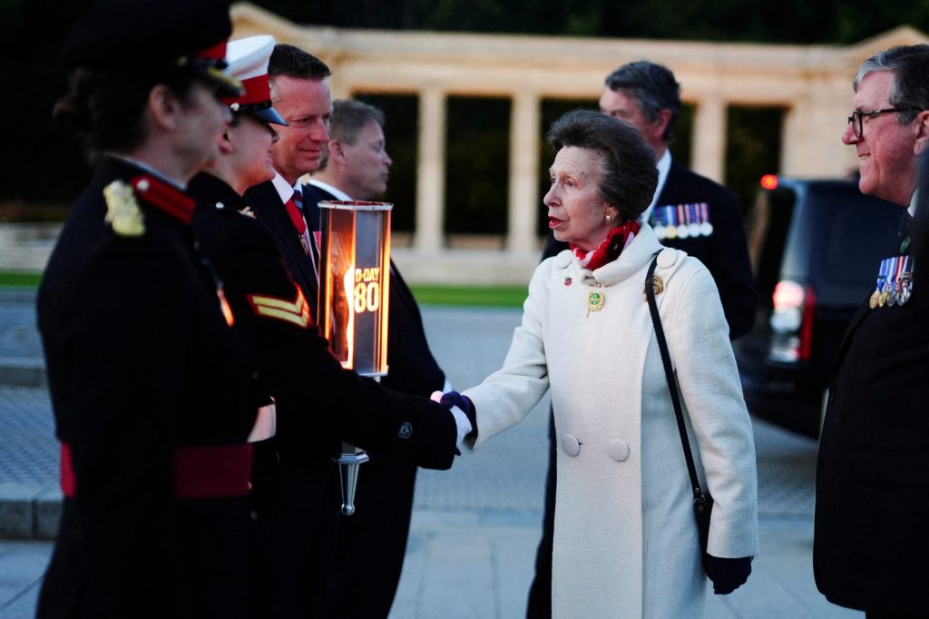 Princess Anne, President of the Commonwealth War Graves Commission, greeting Cadet Corporal Grace Maddison on the 80th anniversary of D-Day, Bayeux War Cemetery, Normandy, France