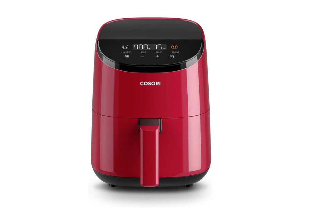 A red air fryer with a touch screen