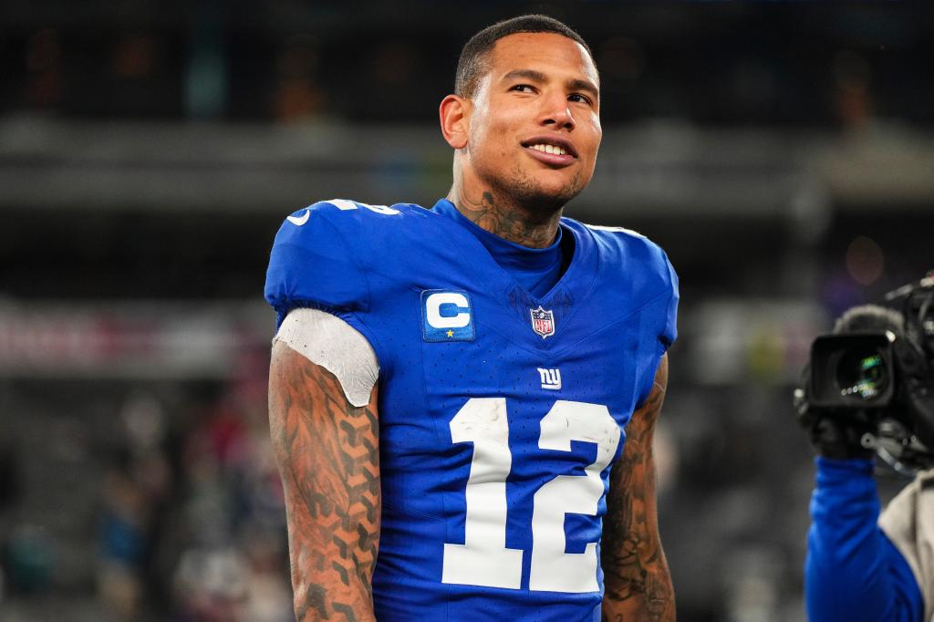 Darren Waller #12 of the New York Giants walks off of the field after an NFL football game against the Philadelphia Eagles at MetLife Stadium on January 7, 2024 in East Rutherford, New Jersey. 