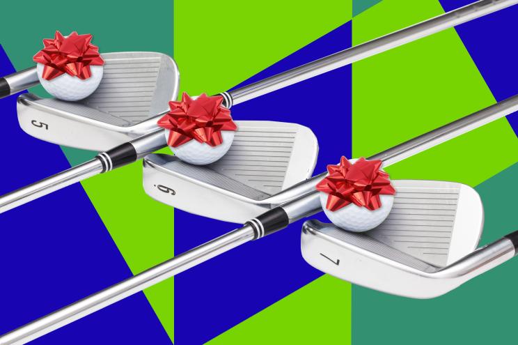 Golf clubs wrapped with a bow as a gift