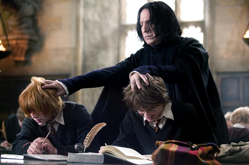 Rupert Grint, Alan Rickman and Daniel Radcliffe in "Harry Potter in the Goblet of Fire." 