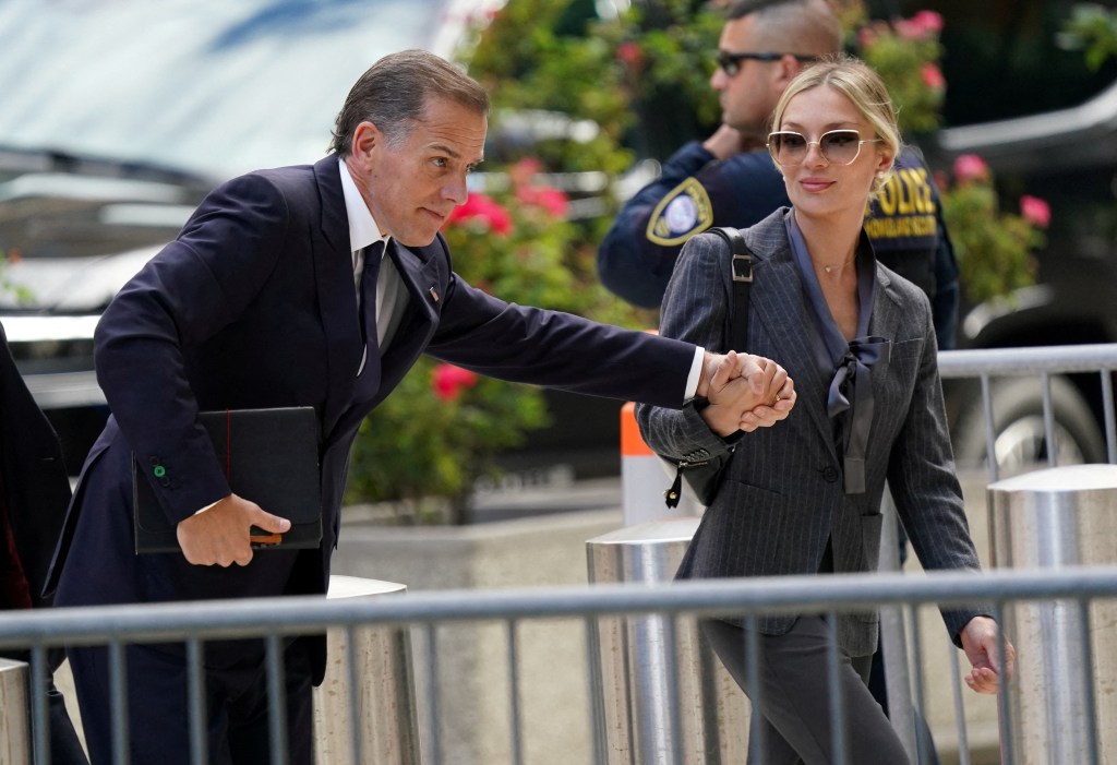 Hunter Biden holds hands with wife Melissa