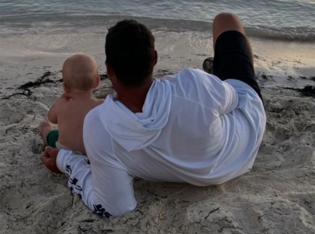 Brooks Koepka shares a sweet moment with son Crew on vacation.