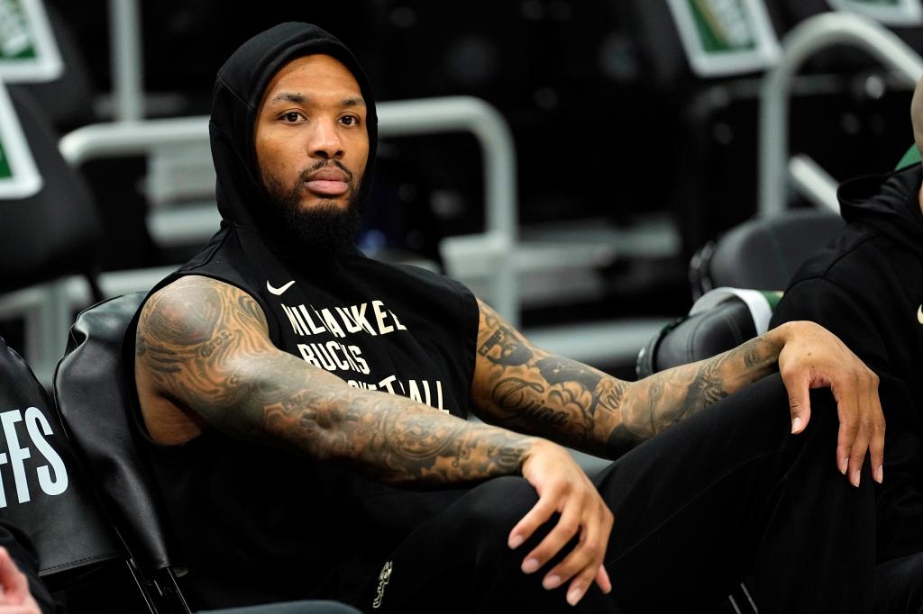 Milwaukee Bucks guard Damian Lillard (0) looks on during warmups prior to game five of the first round for the 2024 NBA playoffs against the Indiana Pacers at Fiserv Forum on April 30, 2024. 