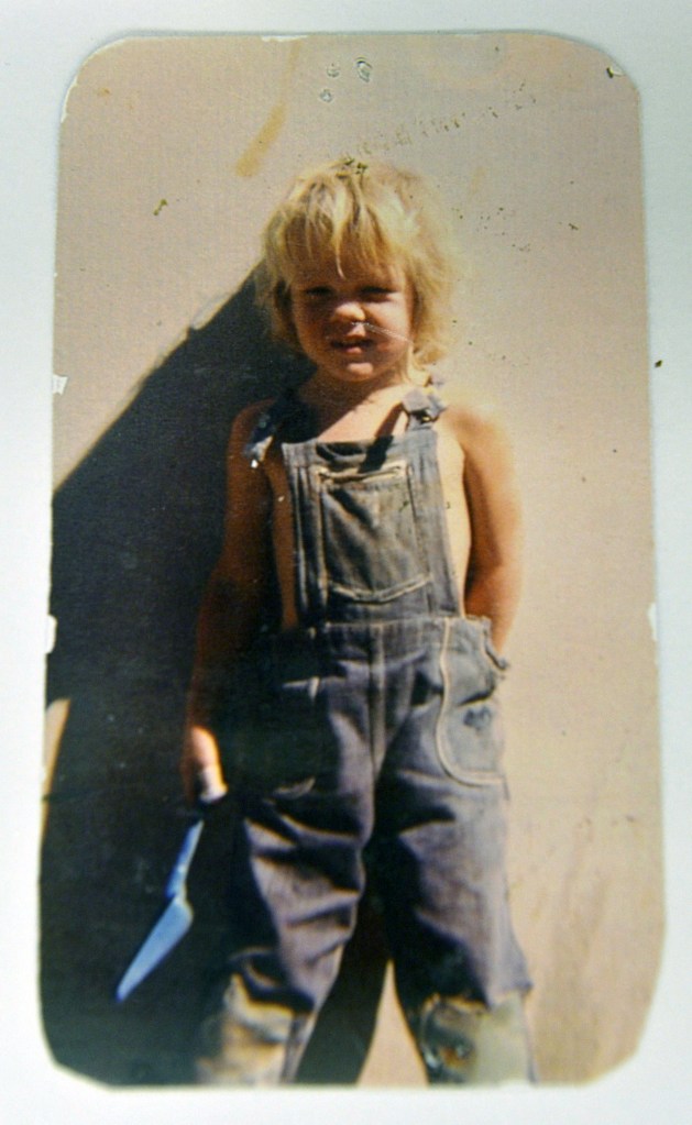 Childhood photograph of Julian Assange displayed by his mother, Christine Assange, during a press conference in Quito