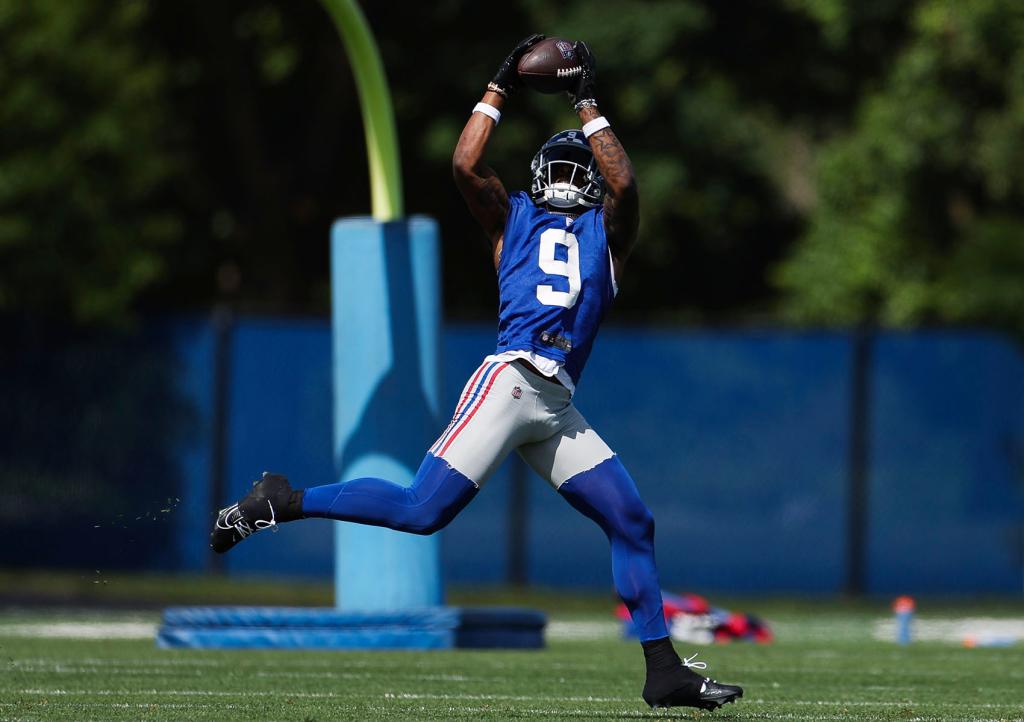 Malik Nabers #9 of the New York Giants makes a catch during OTA Offseason Workouts at NY Giants Quest Diagnostics Training Center on May 30, 2024 in East Rutherford, New Jersey. 