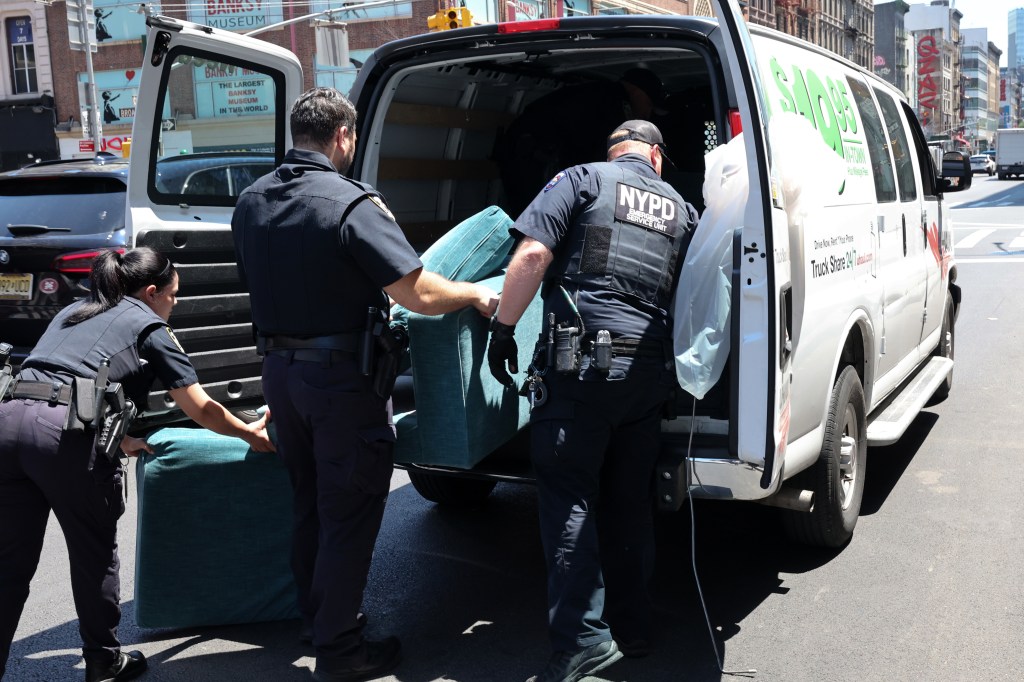 Officers search van.