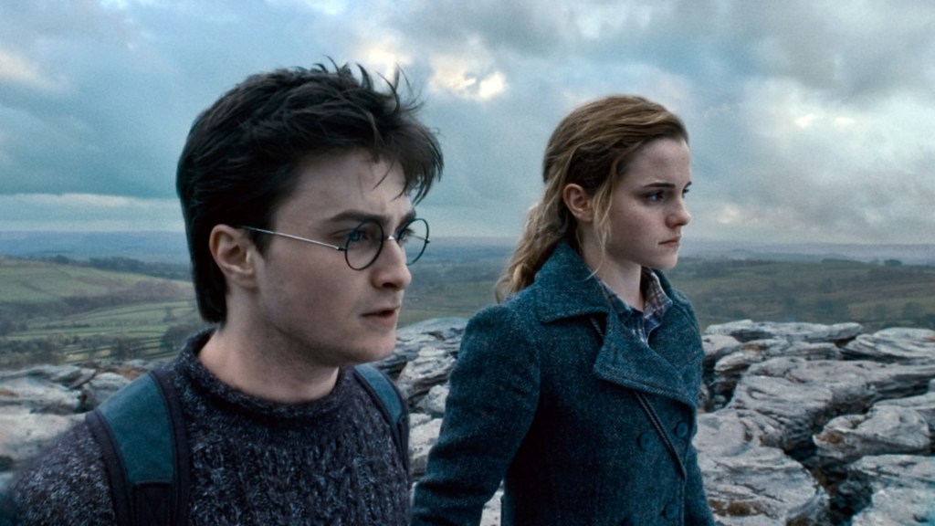 Harry Potter (Daniel Radcliffe) with Hermione Granger (Emma Watson) in "Harry Potter and the Deathly Hallows, Part 1. 