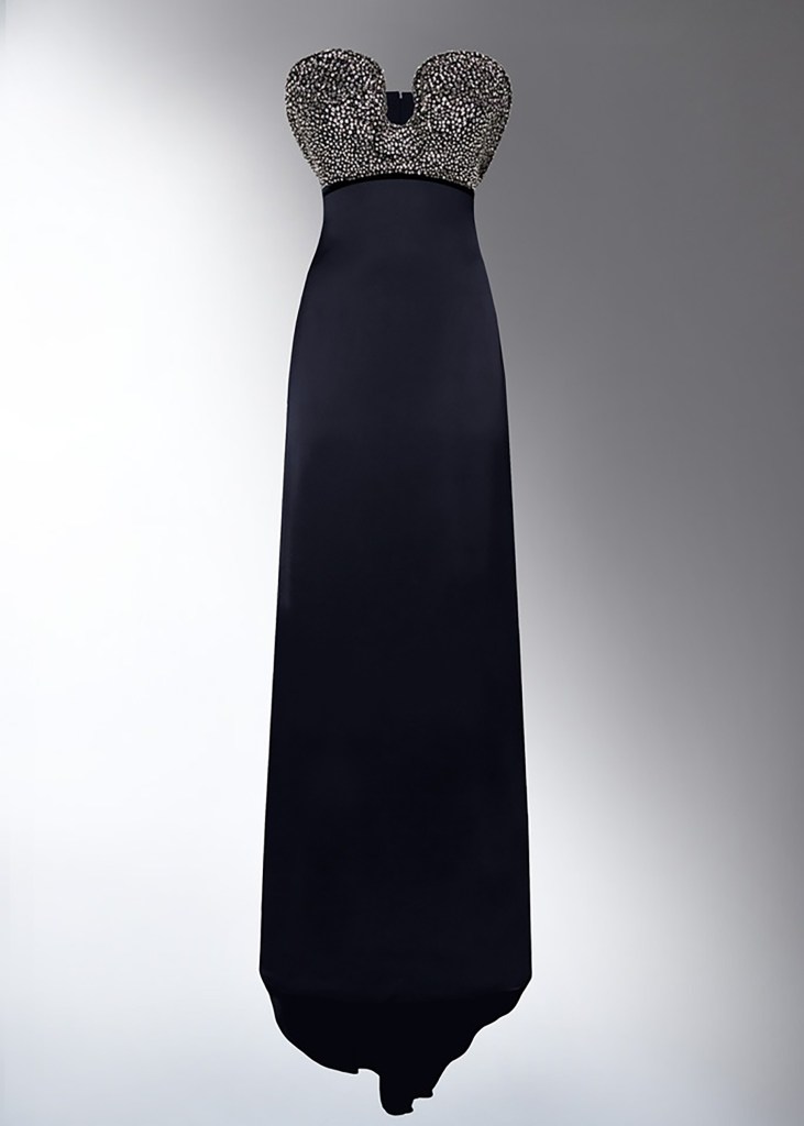 A dark blue embroidered petal bustier gown with a silver beaded top worth $6,700 from Del Core brand
