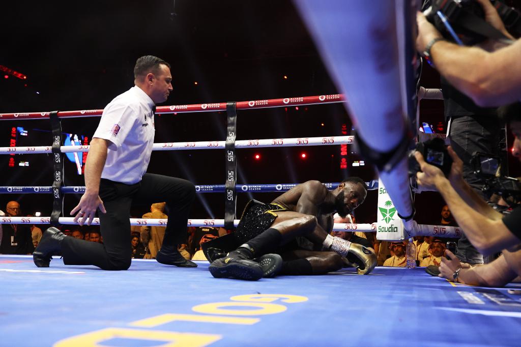 Referee Kieran McCann reacts after Deontay Wilder of Team Matchroom is knocked down by Zhilei Zhang of Team Queensberry (not pictured) during the Heavyweight fight between Deontay Wilder of Team Matchroom and Zhilei Zhang of Team Queensberry on the 5v5: Queensberry v Matchroom Fight Night card at Kingdom Arena on June 01, 2024 in Riyadh, Saudi Arabia. 