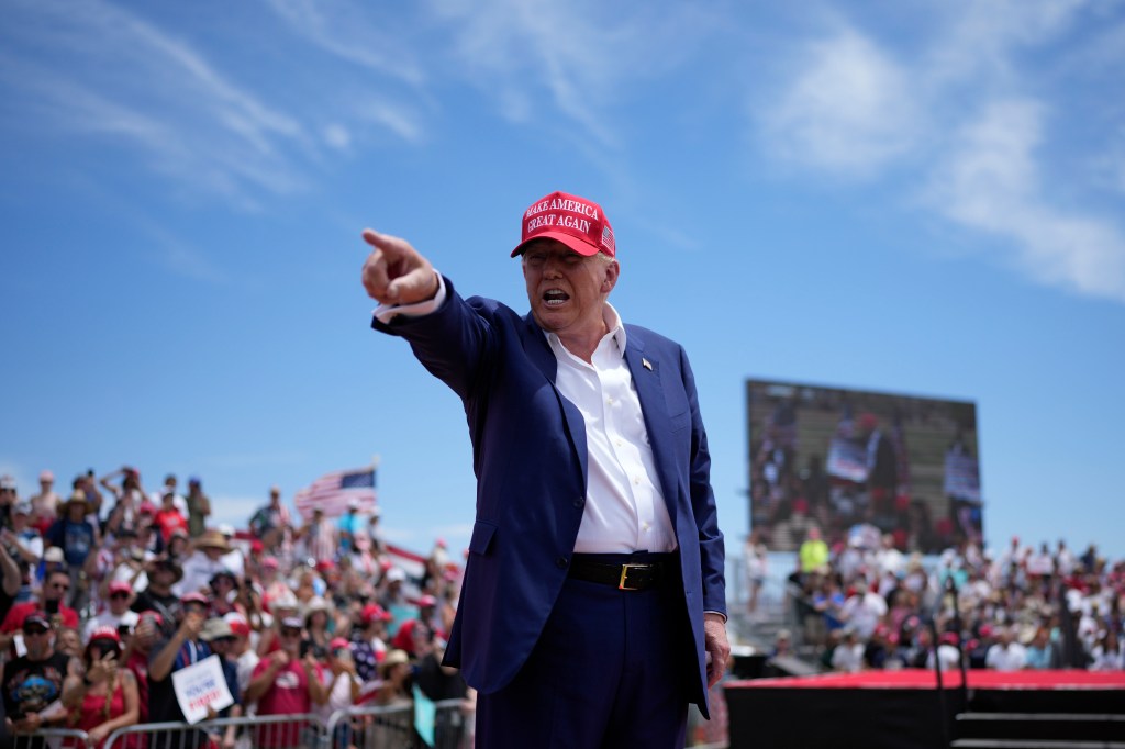 Republican presidential candidate, former President Donald Trump motions to the crowd after speaking at a campaign rally Sunday, June 9, 2024, in Las Vegas. 