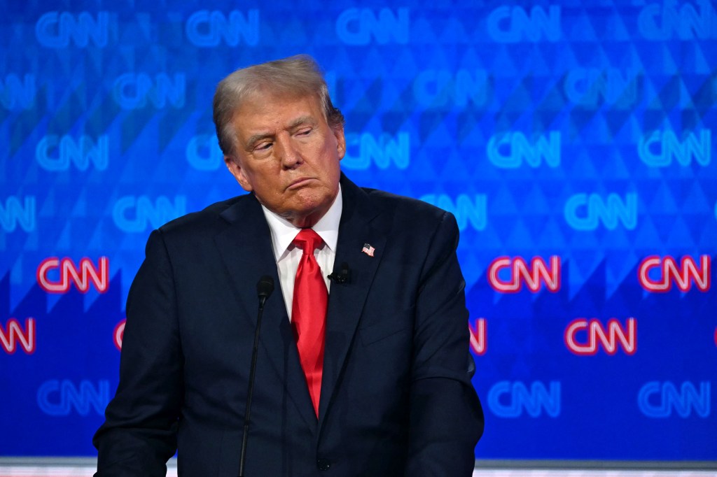 Donald Trump leaving the stage during a commercial break in the first presidential debate of the 2024 elections with Joe Biden, at CNN's studios in Atlanta, Georgia.