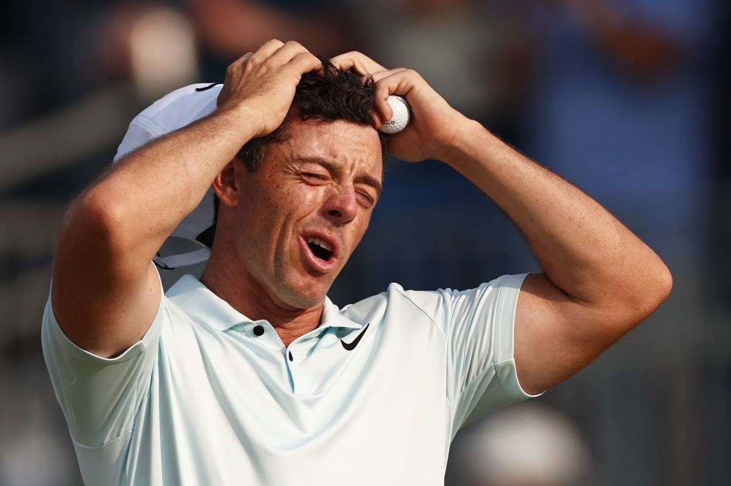 Rory McIlroy reacts after he finishes his final round at the U.S. Open on Sunday in which he blew the lead.