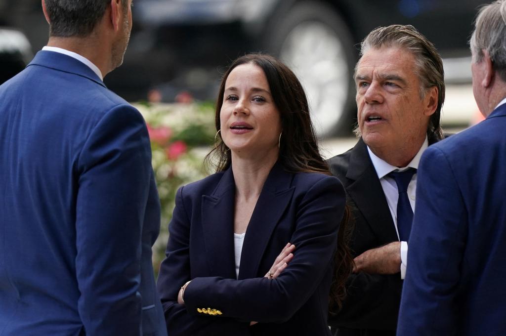 Ashley Biden and Hunter Biden's "money man" Kevin Morris (right) stand outside the federal court.