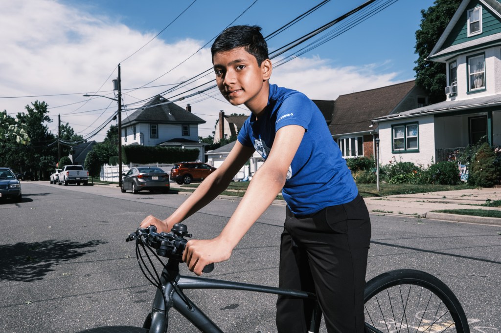 12-year-old prodigy, Suborno Issac Bari, riding a bicycle, heading to NYU for Physics and Math studies