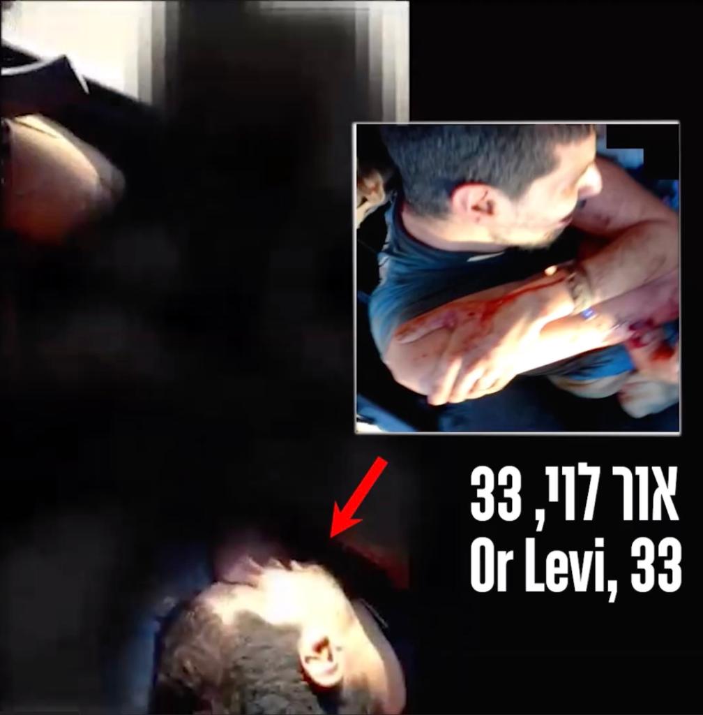 Or Levy, who was covered in his wife's blood, appeared to be gripping an injury on his right arm. 