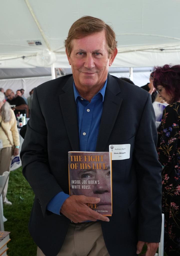 Biographer Chris Whipple with a copy of "The Fight of His Life."