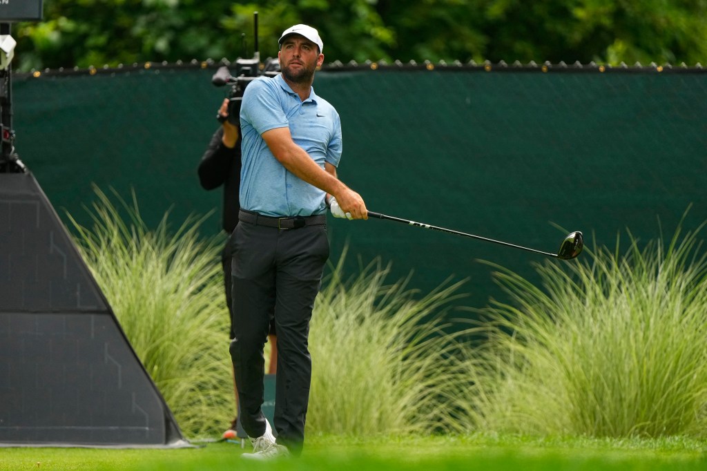 Scottie Scheffler from the tee on the fourth hole during the final round of the Travelers Championship golf tournament at TPC River Highlands. 