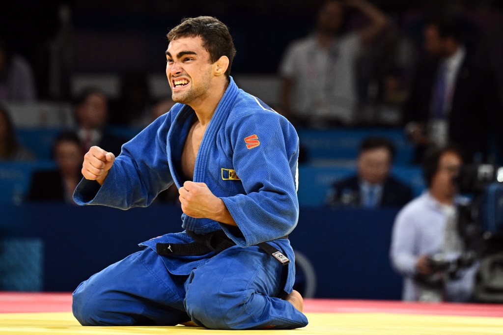 Adil Osmanov of Moldova reacting after winning his bout against Manuel Lombardo of Italy in the Men's -73 kg Judo contest for Bronze Medal A at the Paris 2024 Olympics