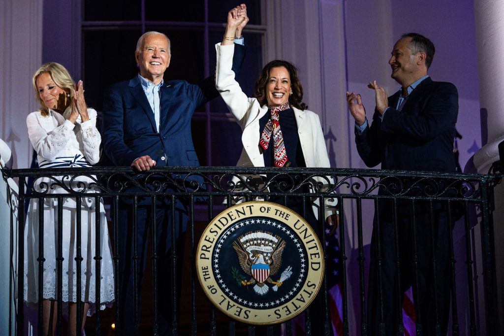 President Joe Biden, First Lady Jill Biden, Vice President Kamala Harris, and Second Gentleman Doug Emhoff standing on the Truman Balcony of the White House on Independence Day, 2024