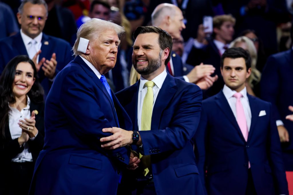 Vance (seen right with Trump in Milwaukee on Tuesday) is considered a proponent of economic populism.