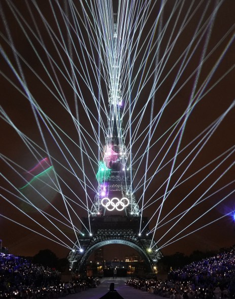 The Eiffel Tower is illuminated during the opening ceremony.