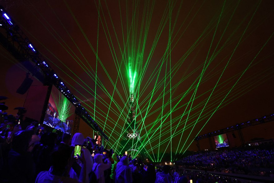 The Eiffel Tower is illuminated during the opening ceremony.