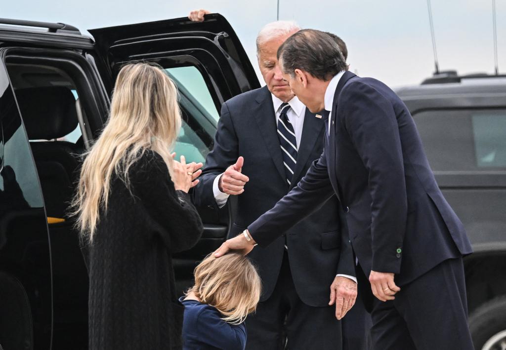 President Joe Biden and Melissa Cohen Biden watching as Hunter Biden reaches out to his son Beau upon arrival at Delaware Air National Guard Base