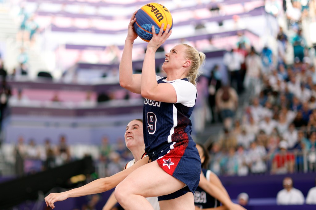 Jul 30, 2024; Paris, France; United States player Hailey van Lith (9) shoots against Germany player Elisa Mevius (8) in the womenâs pool basketball 3x3 game during the Paris 2024 Olympic Summer Games at La Concorde 1. 