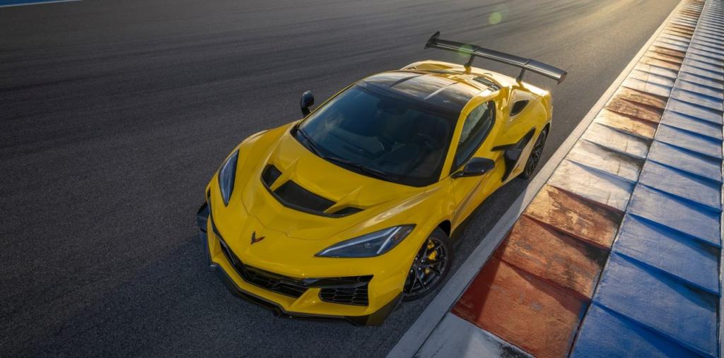 Yellow 2025 Chevrolet Corvette ZR1 driving above-view on a road.